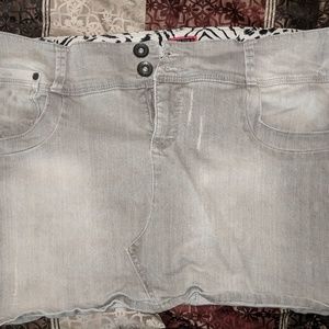 Gray denim skirt with pearl and grommet detailing
